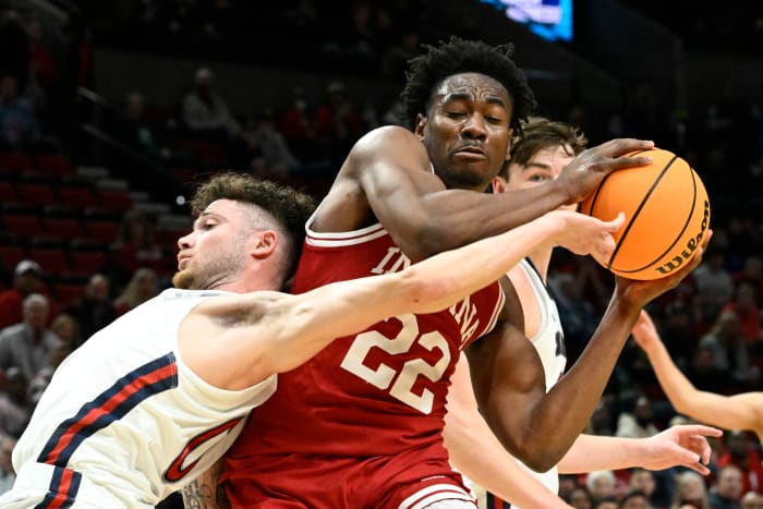 Jordan Geronimo tries to protect the ball from Saint Mary's defenders.